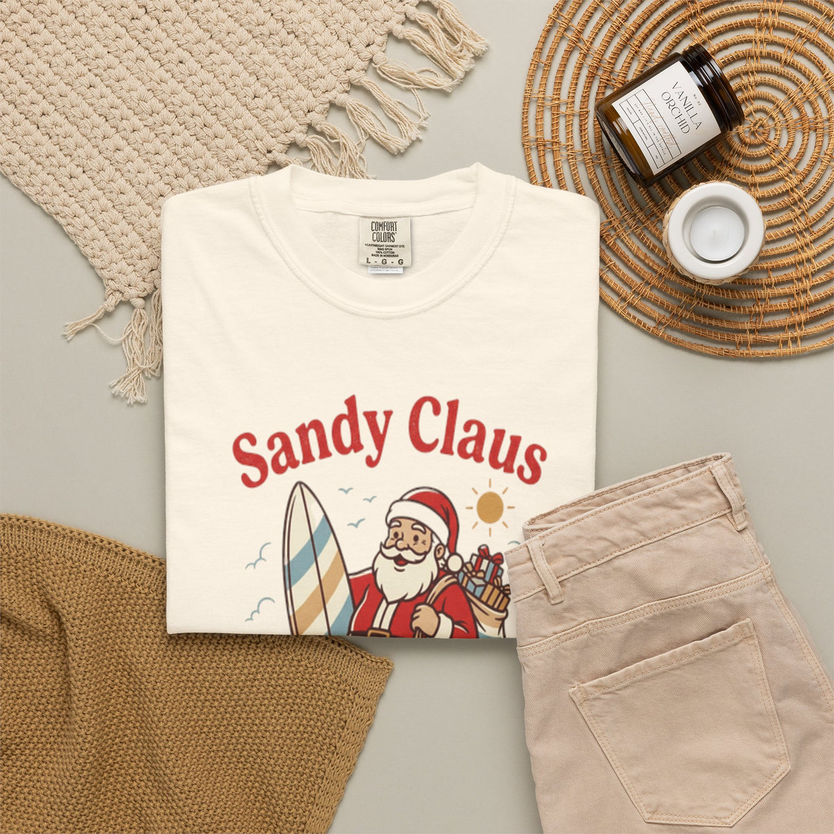 Sandy Claus Is Coming to Town T-Shirt | Funny Surfing Santa Coastal Christmas Tee