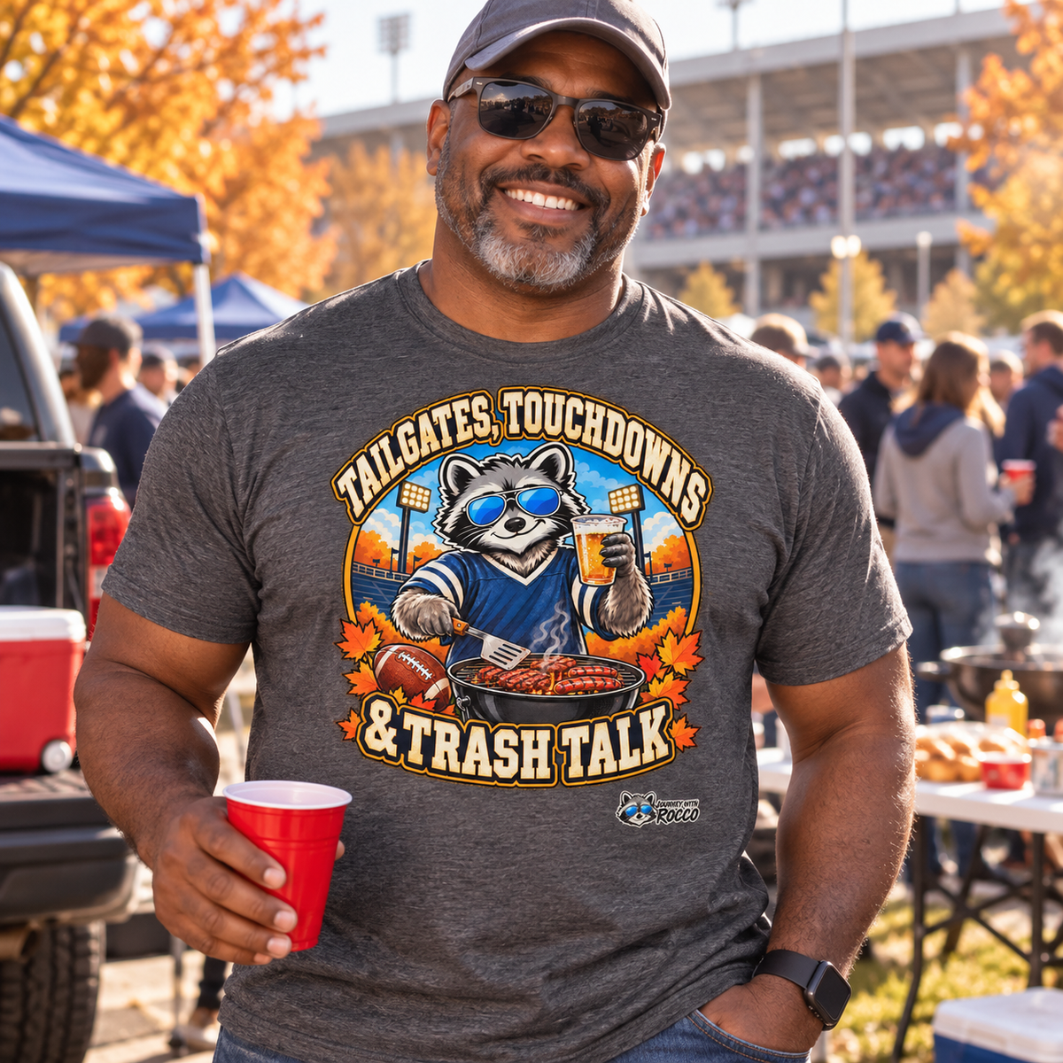 Rocco Raccoon “Tailgates, Touchdowns & Trash Talk” T-Shirt | Funny Football Tailgate Tee | Journey with Rocco Series