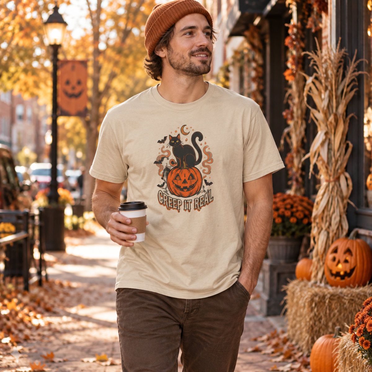 Keep spooky season stylish with this funny Creep It Real black cat t-shirt featuring a vintage jack-o'-lantern, bats, and retro Halloween vibes.