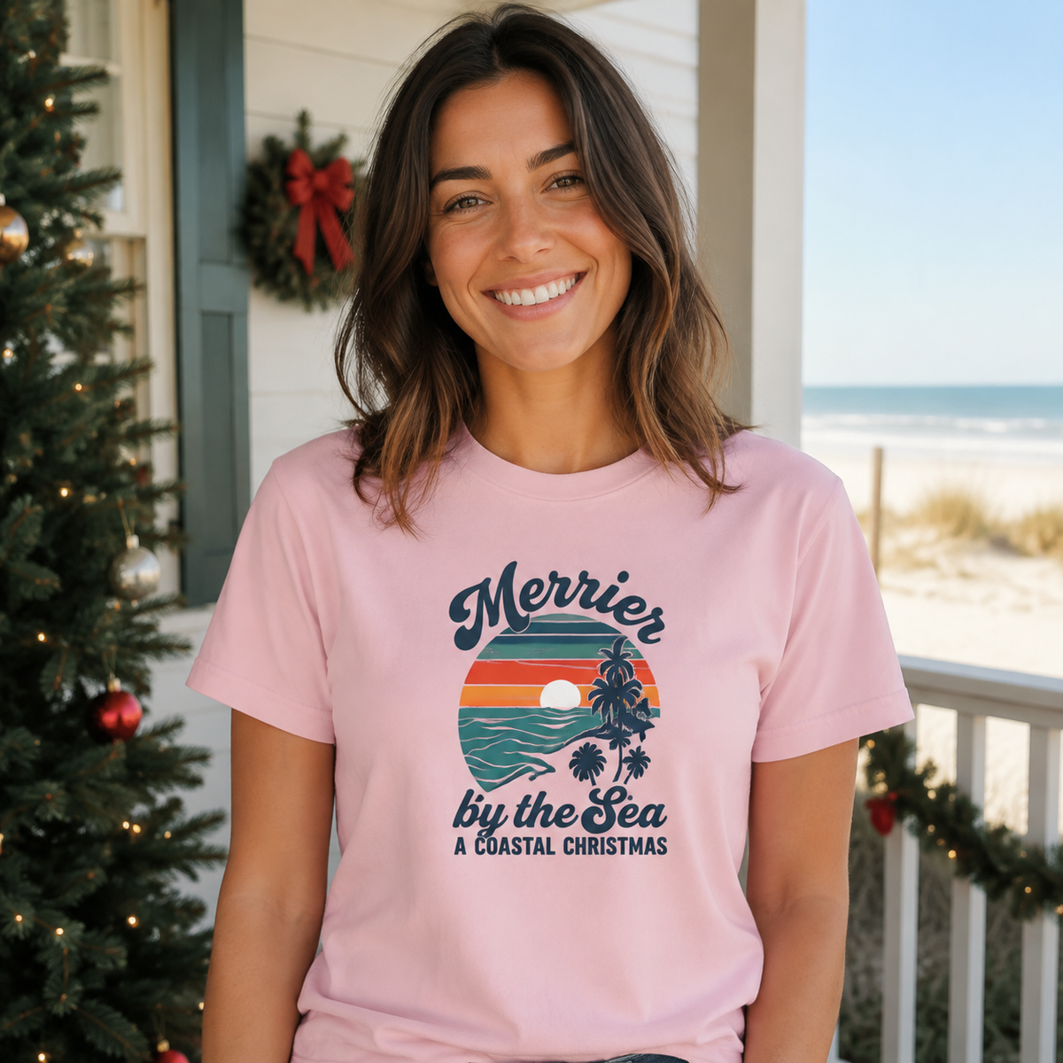 Merrier by the Sea Coastal Christmas T-Shirt | Tropical Sunset Beach Holiday Tee
