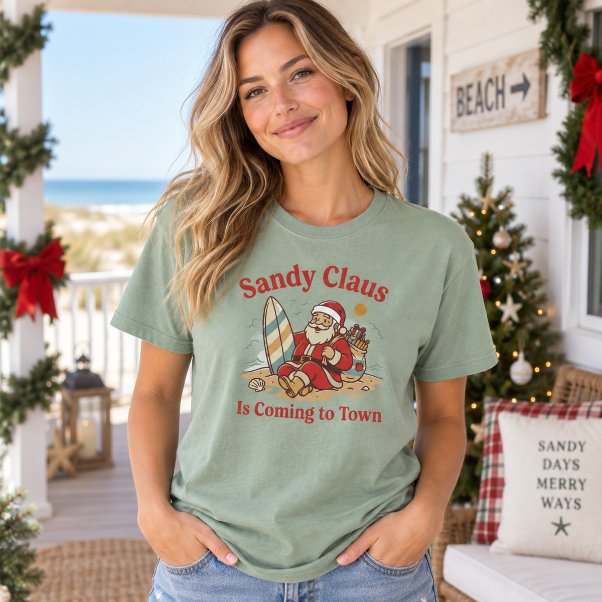 Sandy Claus Is Coming to Town T-Shirt | Funny Surfing Santa Coastal Christmas Tee